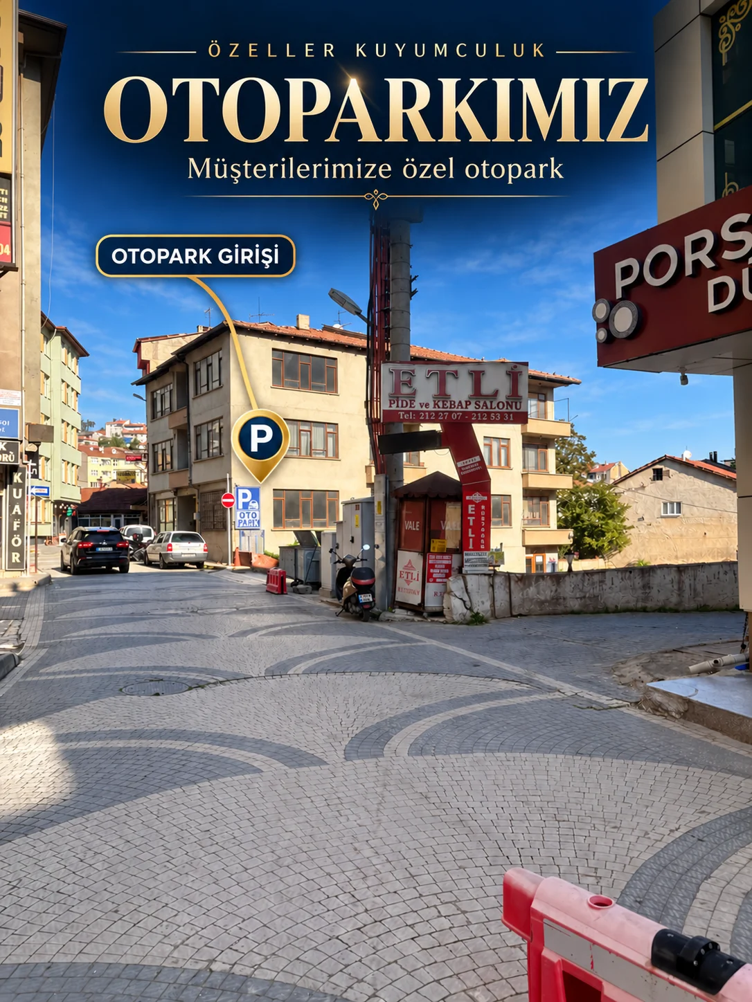 Özeller Kuyumculuk otopark girişinin konum işaretiyle gösterildiği sokak fotoğrafı
